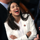Rep. Alexandria Ocasio-Cortez (D-NY) talks to fellow members of Congress during the first session of the 116th Congress at the U.S. Capitol January 03, 2019 in Washington, DC.